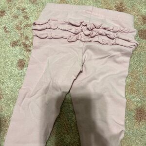 Koala baby brand. 6-9 months. Light pink. Used condition. Ruffles front and back